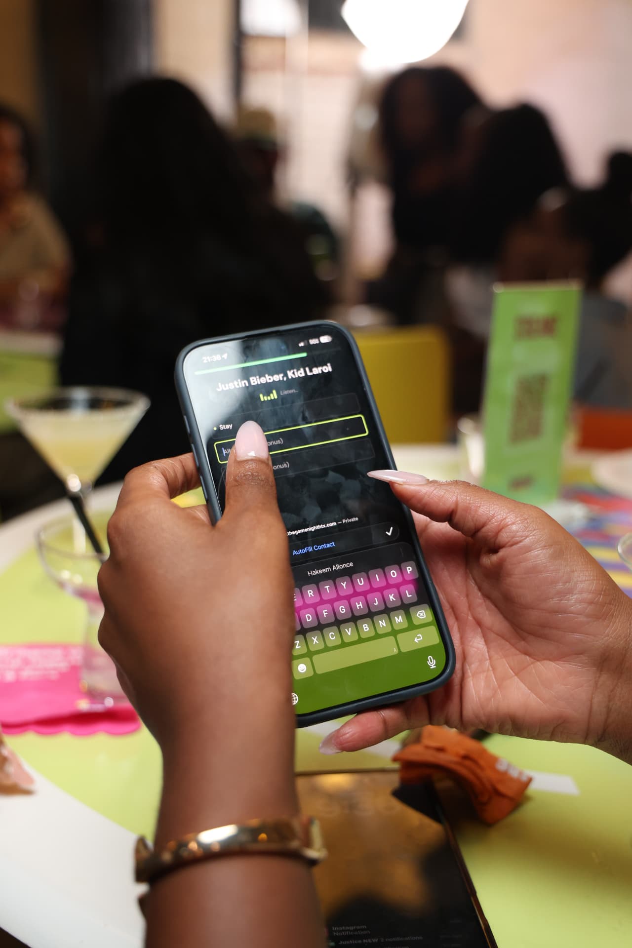 Guest answering a music trivia question on a phone